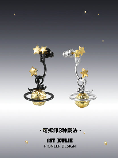Y2K star earrings featuring gold planet and star charms in silver and black colors