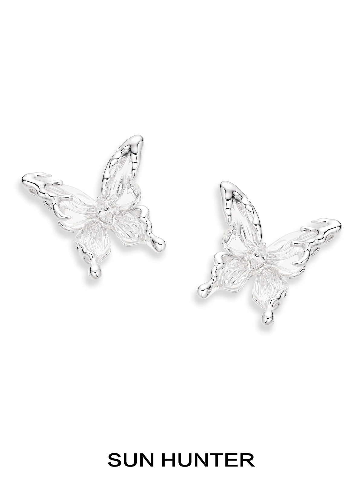 Elegant SUN HUNTER 3D butterfly earrings in silver for a stylish and whimsical look