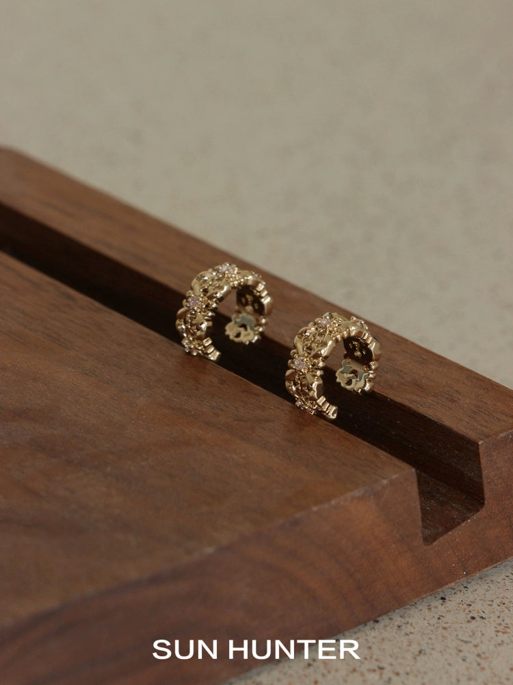 SUN HUNTER vintage iris ear cuff featuring a unique floral design in gold tones