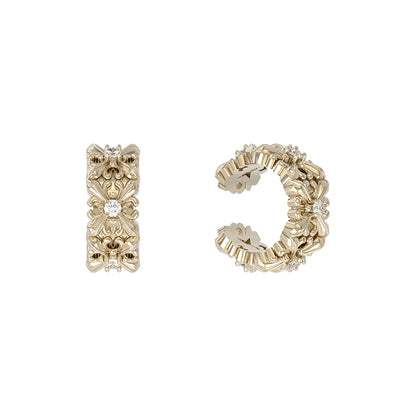 Elegant vintage iris ear cuff with intricate detailing and sparkling accents for a stylish finish