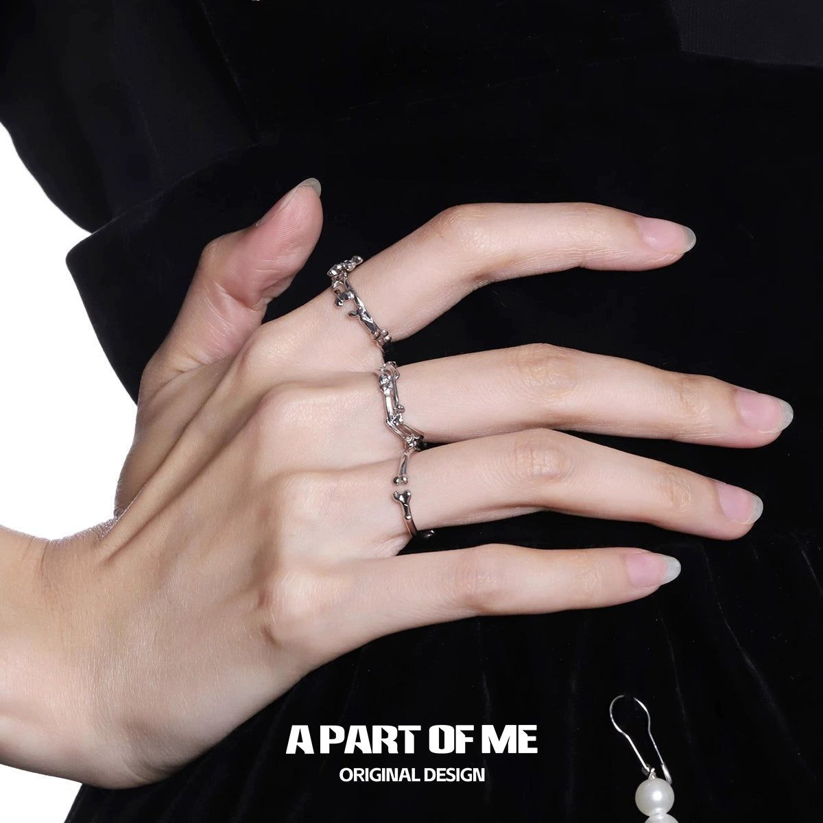 A PART OF ME abstract bone silver ring elegantly displayed on a model's hand
