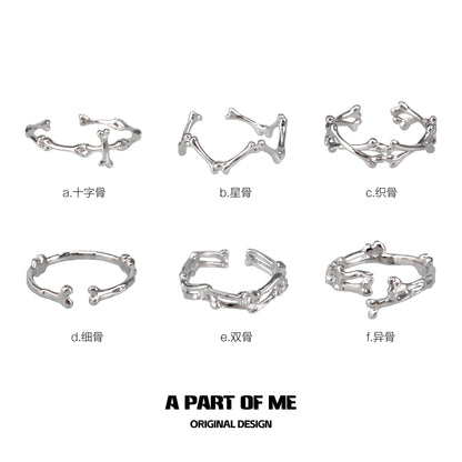 A collection of abstract bone silver rings by A PART OF ME showcasing unique and modern designs
