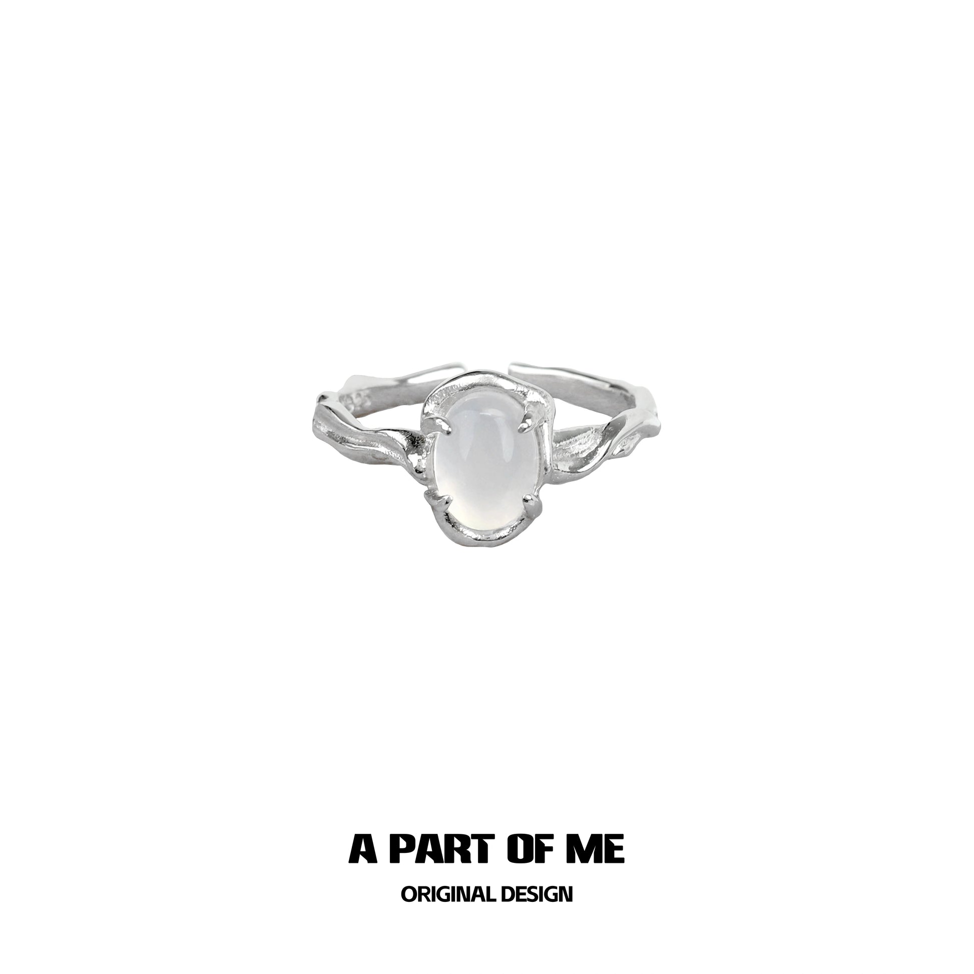 Sterling silver agate textured ring featuring a smooth oval gemstone centerpiece