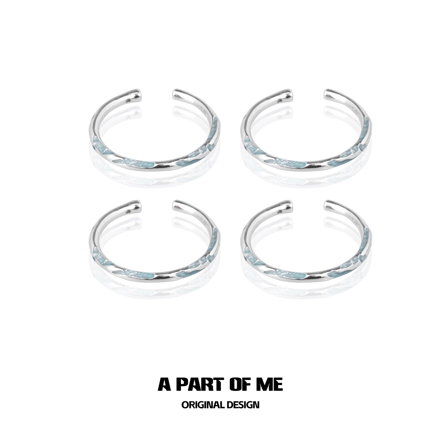 Set of four A PART OF ME blue minimalist rings with sleek silver accents for stylish wear