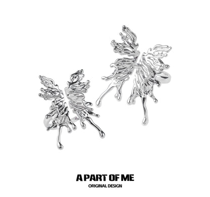 A PART OF ME butterfly liquid metal ring with an intricate flame-like design and shiny silver finish
