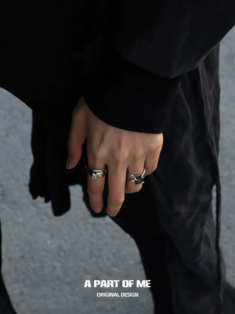 A PART OF ME clear quartz ring worn on fingers with stylish black attire