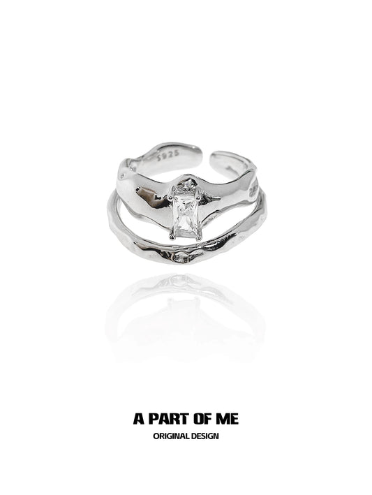 A PART OF ME original design clear quartz ring with a unique twisted band and sparkling gemstone
