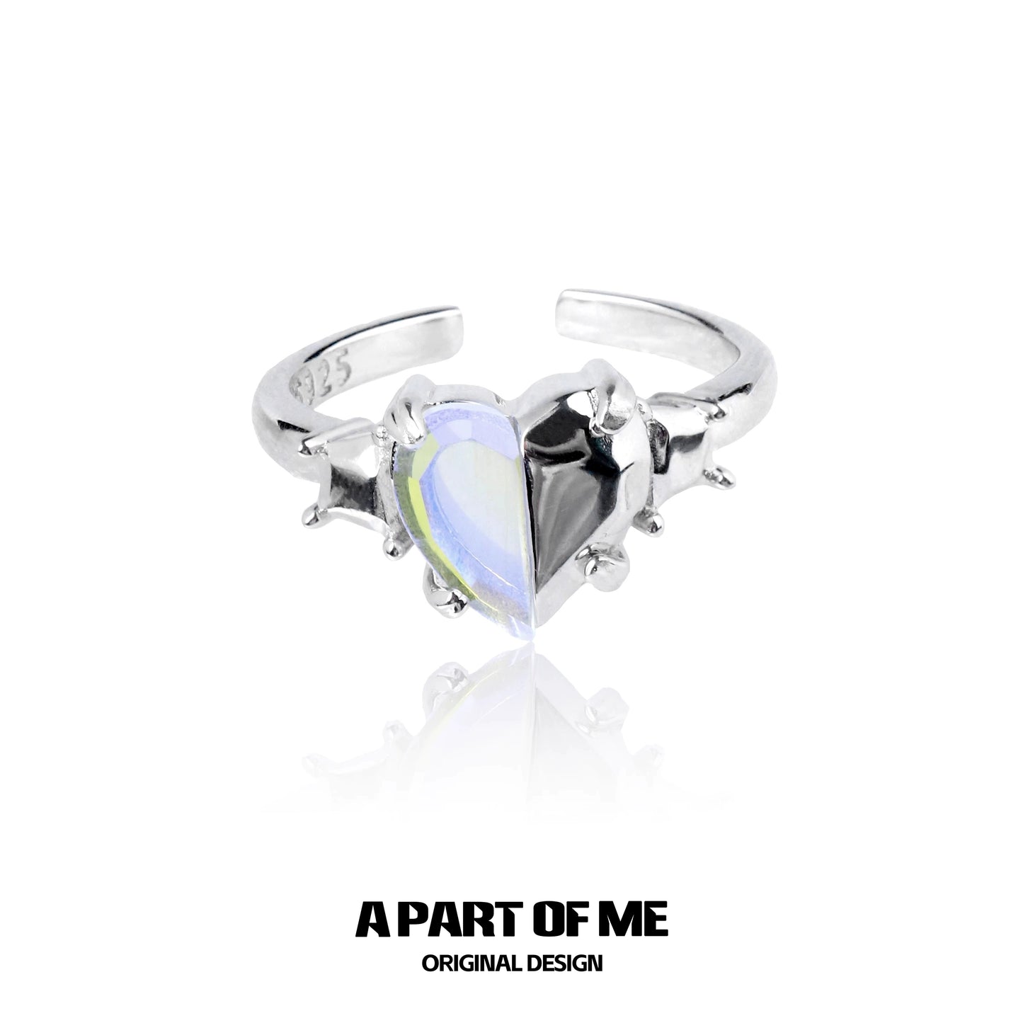A PART OF ME color changing armor ring featuring a heart-shaped dual color gemstone in a silver setting