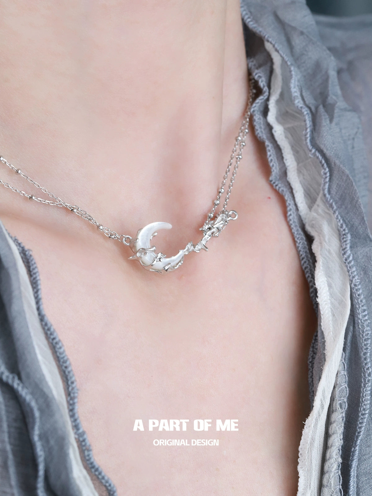 A PART OF ME crescent moon necklace in silver with delicate design for elegant style