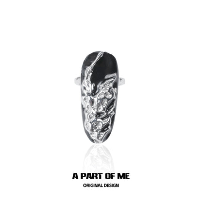 Dark Queen Finger Guard Ring by A PART OF ME featuring a textured black and silver design
