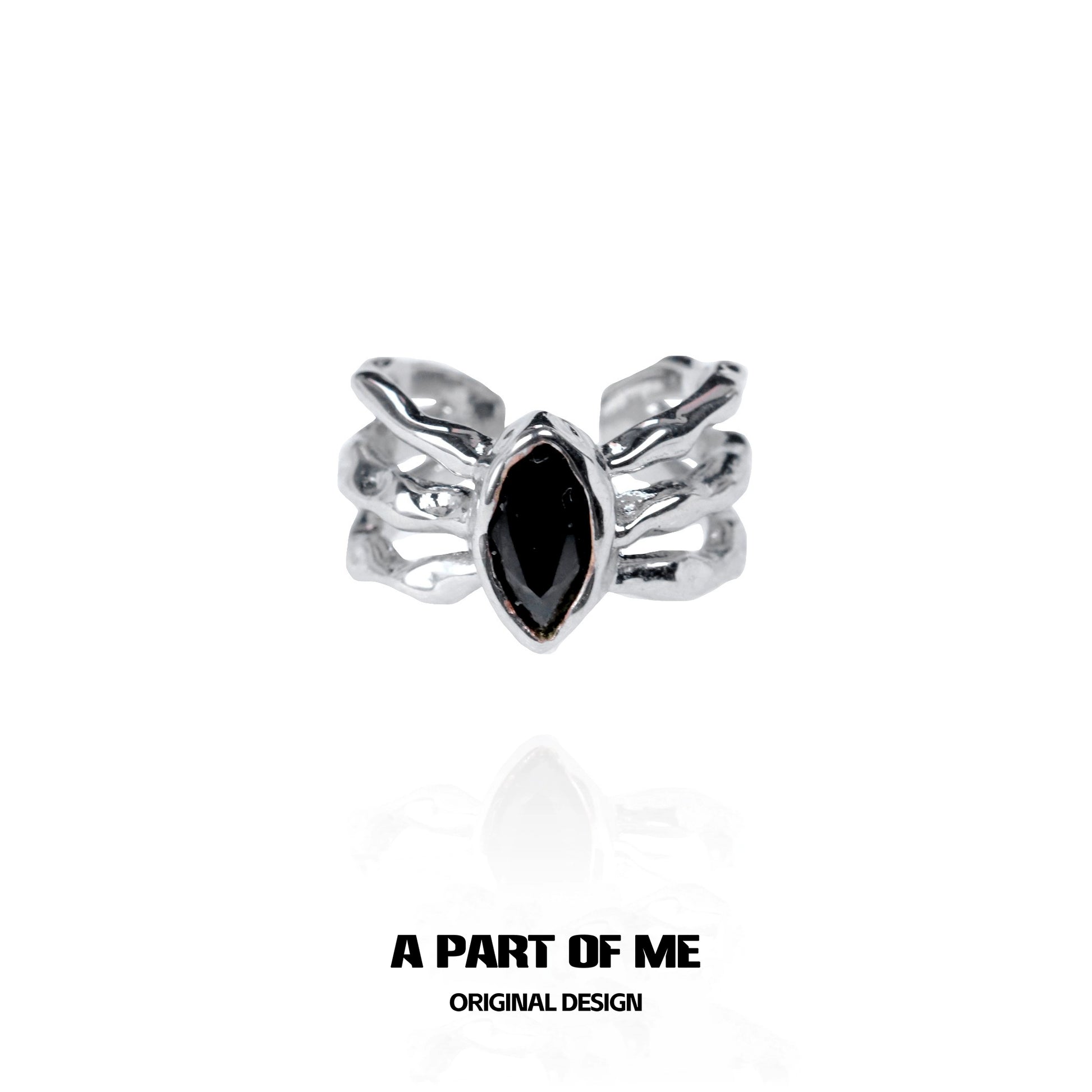 Dark queen finger guard ring featuring a black marquise stone and unique silver design