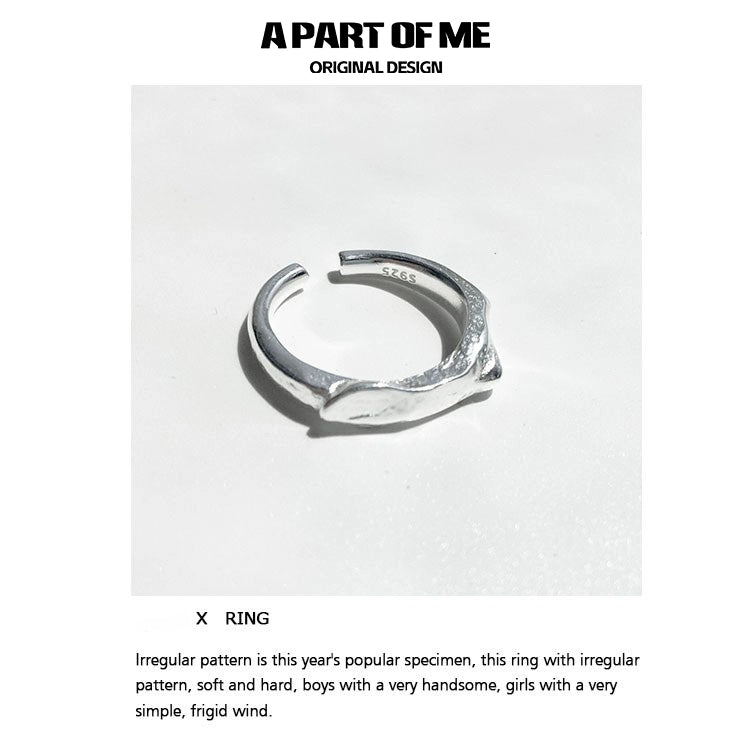 A PART OF ME geometric star ring in silver with an irregular pattern for a unique style