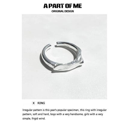 A PART OF ME geometric star ring in silver with an irregular pattern for a unique style