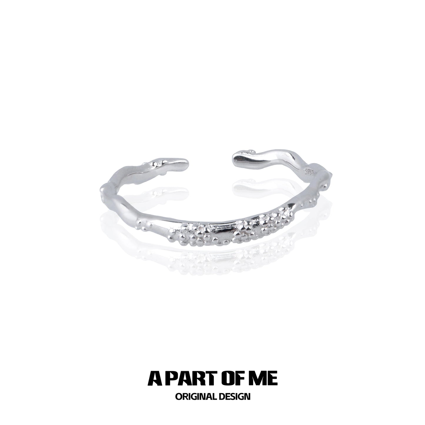 A PART OF ME minimalist lunar texture ring in silver with a unique, organic design for elegant wear
