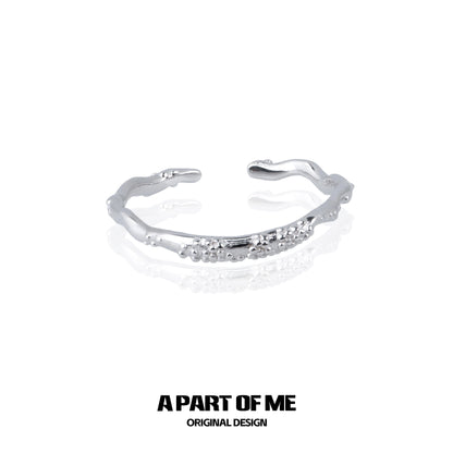 A PART OF ME minimalist lunar texture ring in silver with a unique, organic design for elegant wear
