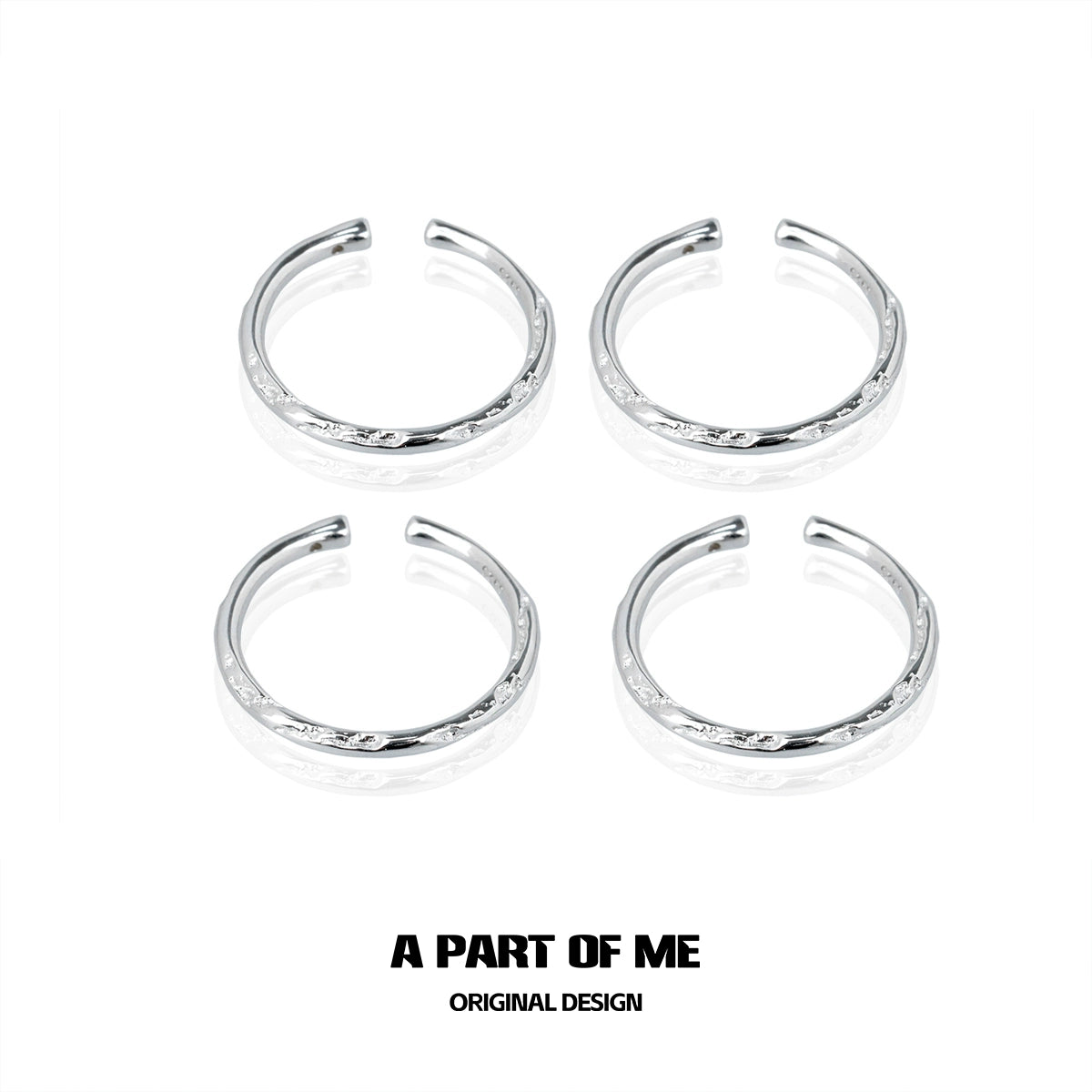 Set of four A PART OF ME minimalist stack rings in silver with delicate details