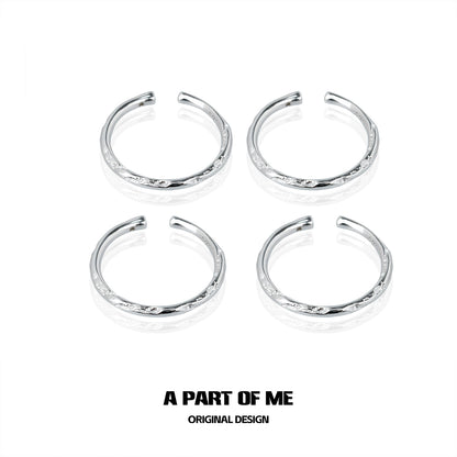 Set of four A PART OF ME minimalist stack rings in silver with delicate details