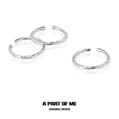 Set of three elegant minimalist stack rings in silver perfect for layering and everyday wear