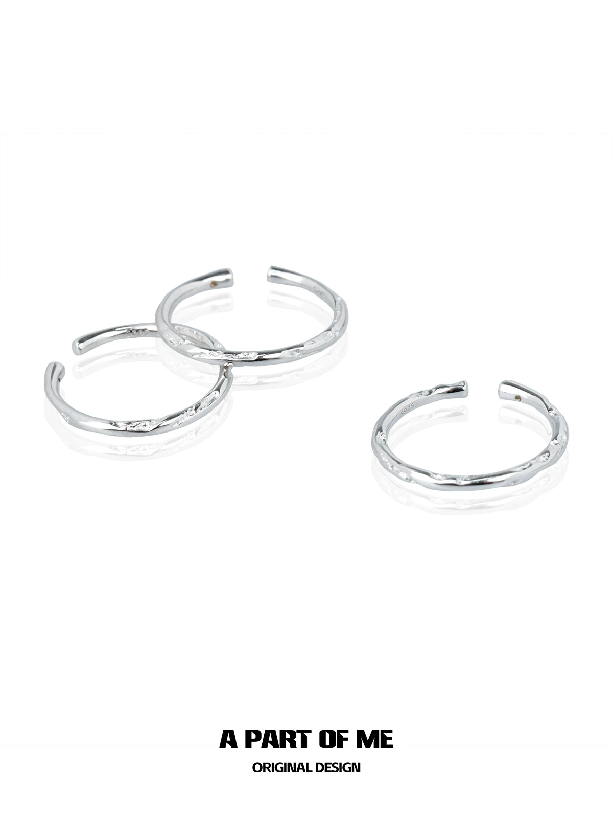 Three minimalist stack rings in silver by A PART OF ME with a sleek and modern design
