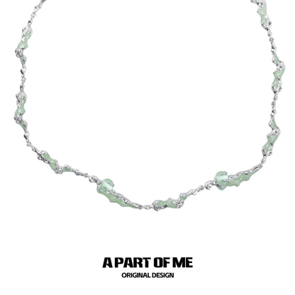 A PART OF ME opal anchor necklace featuring a unique wavy design with delicate detailing
