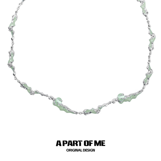 A PART OF ME opal anchor necklace featuring a unique wavy design with delicate detailing