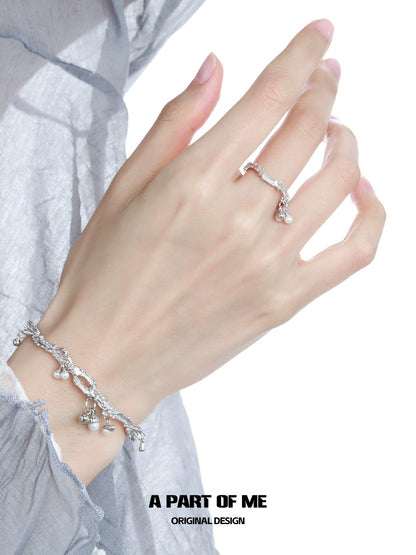 A PART OF ME pearl elf silver ring elegantly worn on a hand, showcasing its unique design and charm