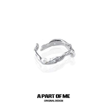A Part of Me Pearl Statement Ring in Silver with a Unique Twisted Design