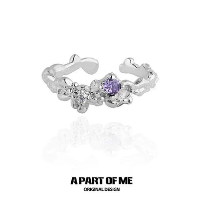 A Part of Me purple zircon wave ring with floral design and sparkling gems