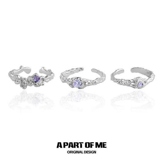A Part of Me purple zircon wave ring collection featuring three unique silver designs