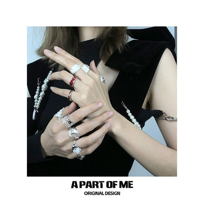 Fashionable A PART OF ME red venom couple rings showcased on stylish hands with elegant accessories