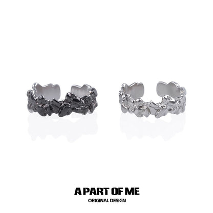 A PART OF ME rock band ring for men in silver and black finishes with unique textured design