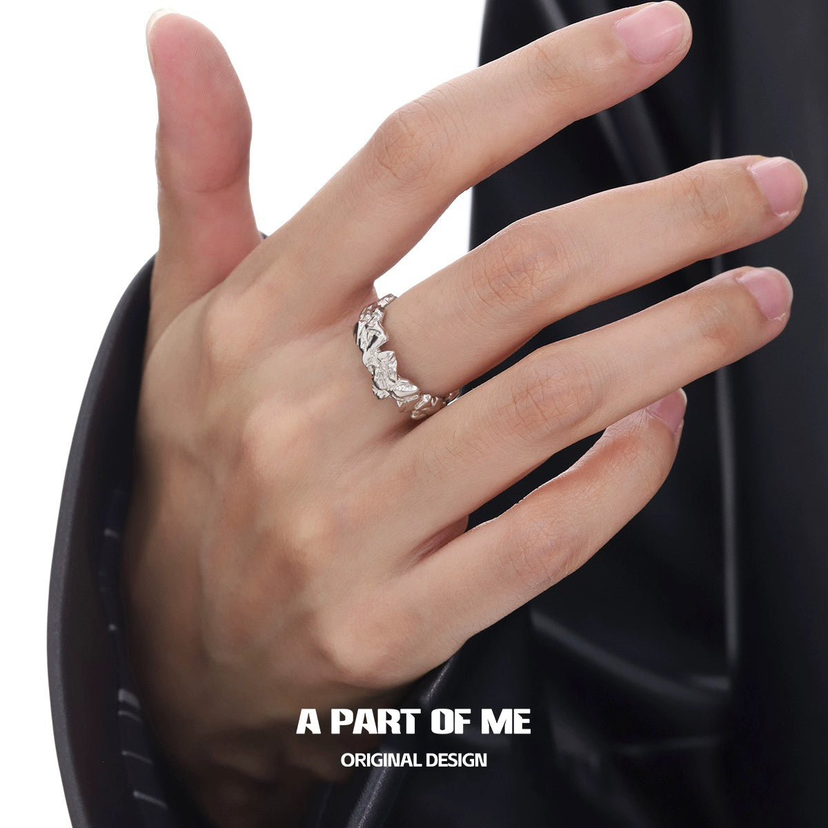 Stylish A PART OF ME rock band ring for men with intricate design on a finger