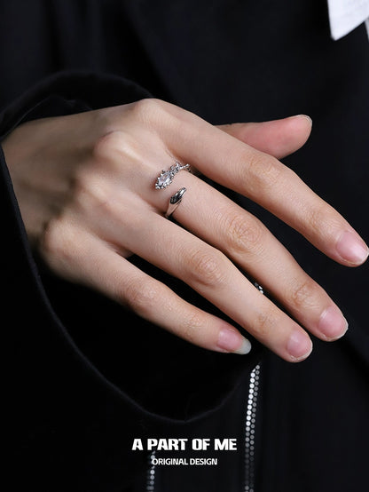 Stylish snake diamond silver ring displayed on a hand showcasing its elegant design