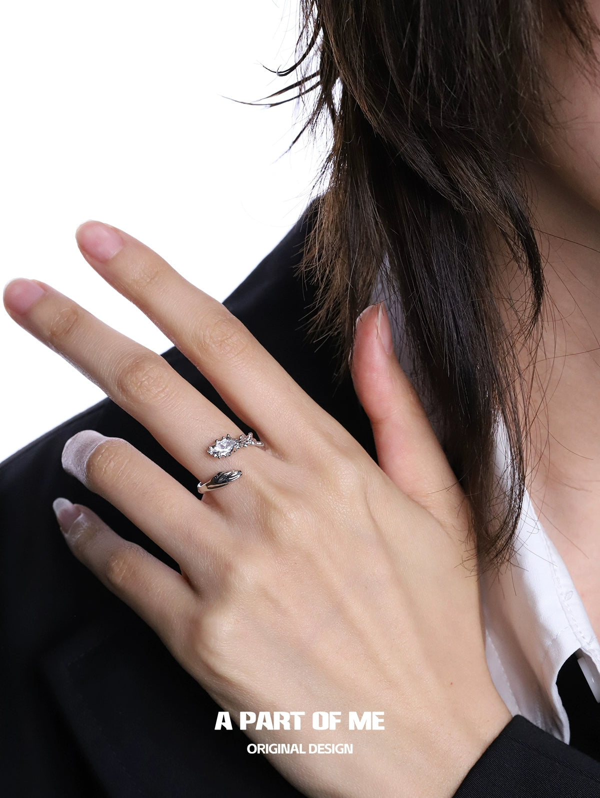 Elegant snake diamond silver ring showcased on a hand with stylish attire
