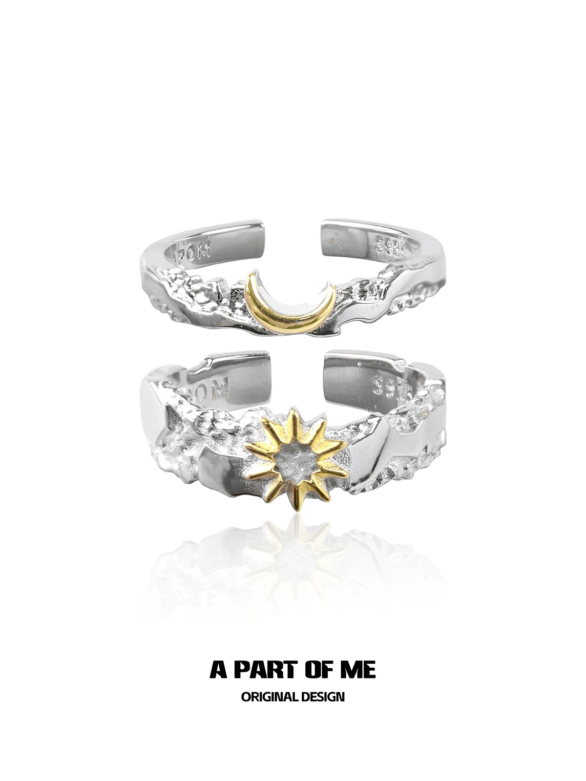 Silver sun and moon couple rings featuring a gold crescent moon and a gold sun design