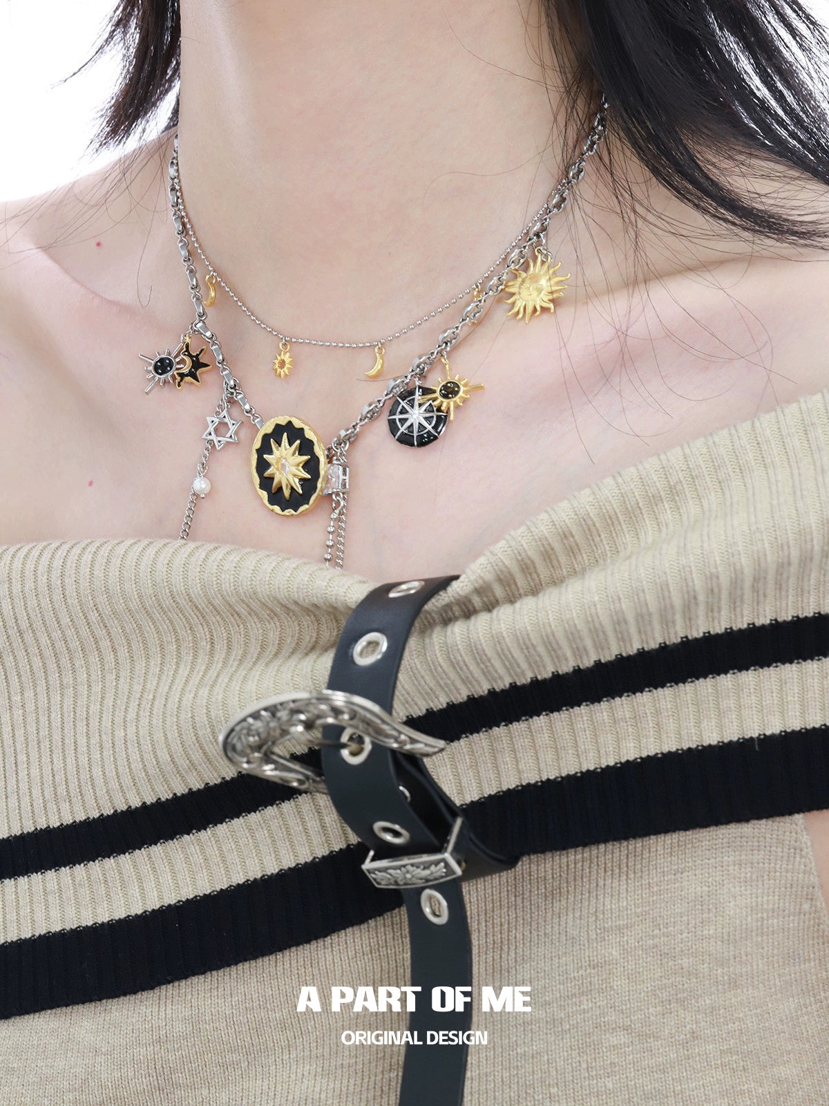 Layered sun and moon necklace with celestial charms for a unique and stylish look