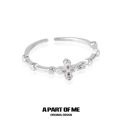 Textured cross silver ring featuring a delicate design with sparkling accents for a unique look