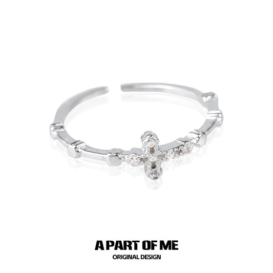 Textured cross silver ring featuring a delicate design with sparkling accents for a unique look