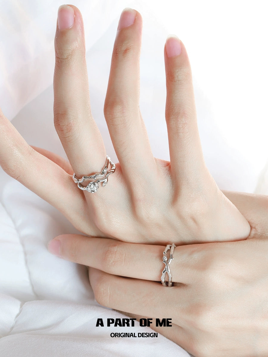 A PART OF ME thorned rose silver ring displayed on elegant fingers for a stylish look
