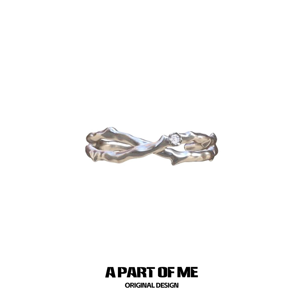 Thorned rose silver ring featuring an elegant twisted design and a sparkling stone