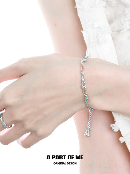 Elegant silver bracelet featuring wavy links designed by A PART OF ME with a touch of sophistication