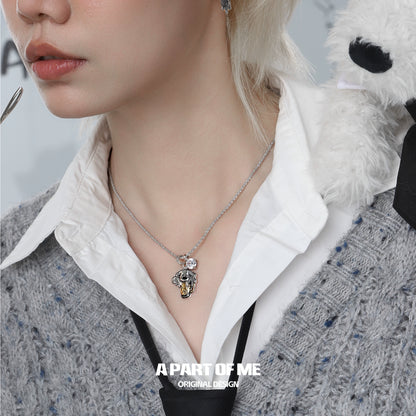 Stylish working puppy necklace featuring a cute puppy charm and intricate design by A PART OF ME