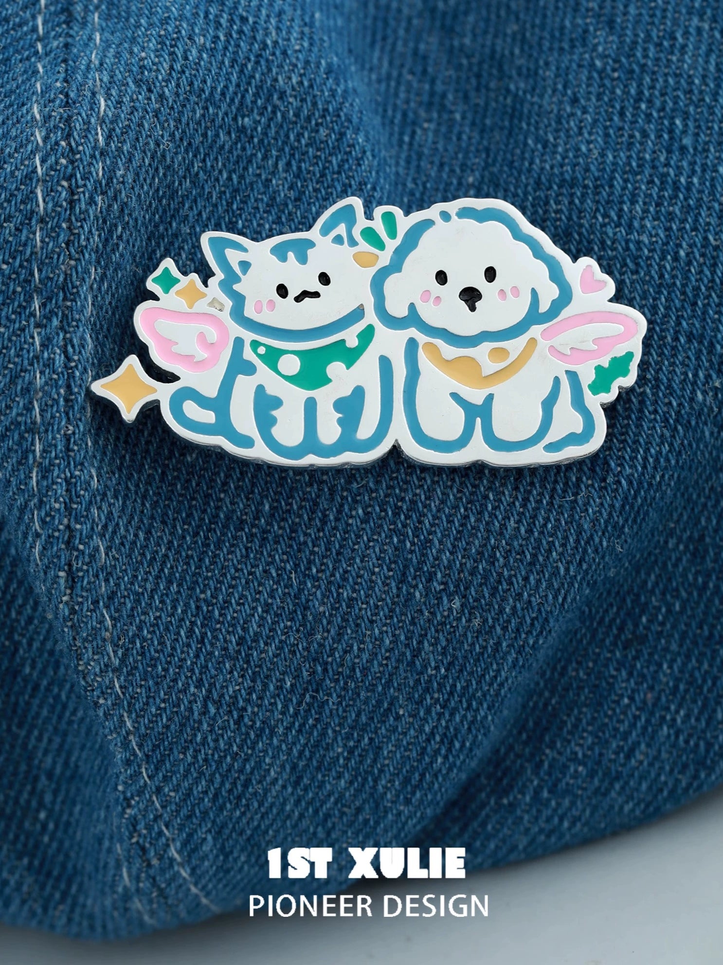 Adorable angel cat and dog brooch featuring cute designs on a denim background