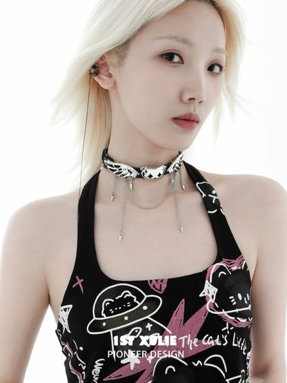 Model showcasing an angel cat necklace with silver details and a black outfit for a stylish look
