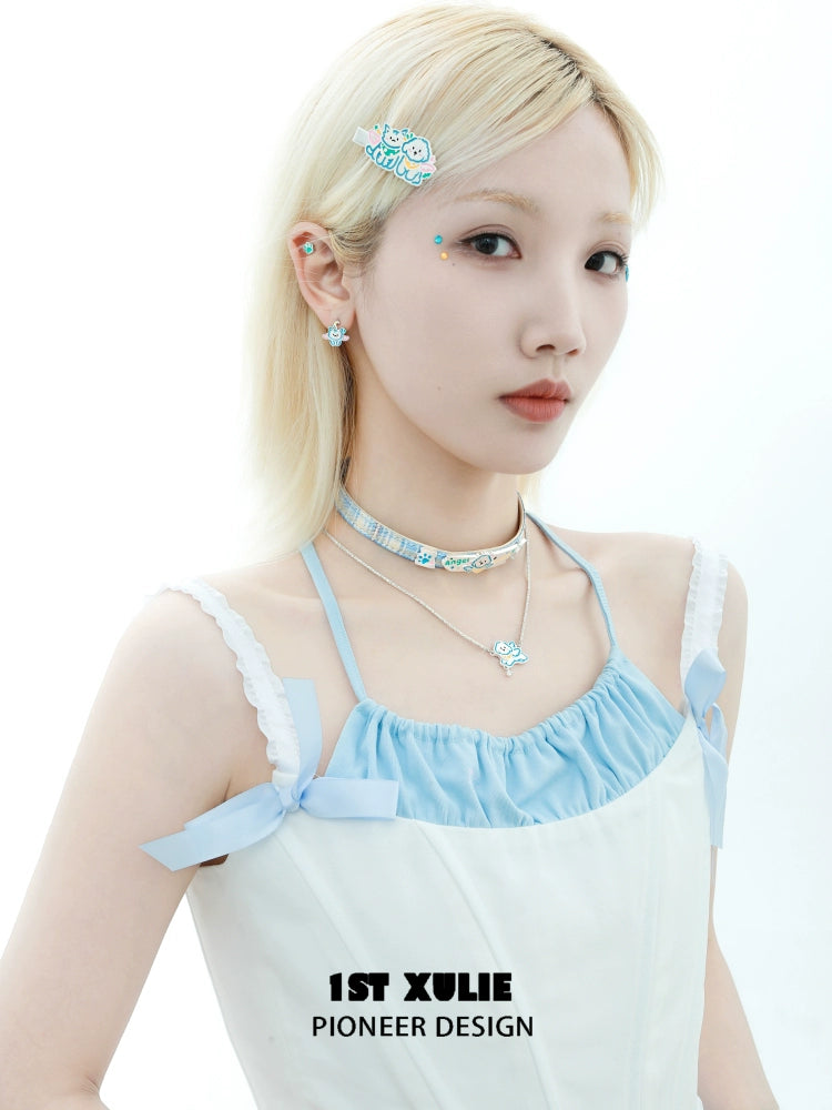 Model wearing an angel cat puppy necklace with matching accessories for a stylish look