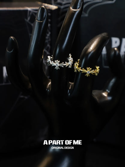 Elegant cross couple rings in silver and gold featuring sparkling accents for couples