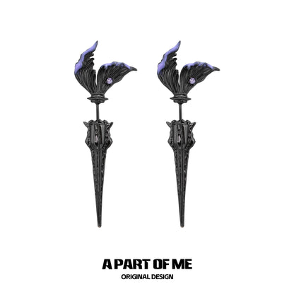 A PART OF ME fishtail dart sword earrings with intricate black and purple design for a bold statement.