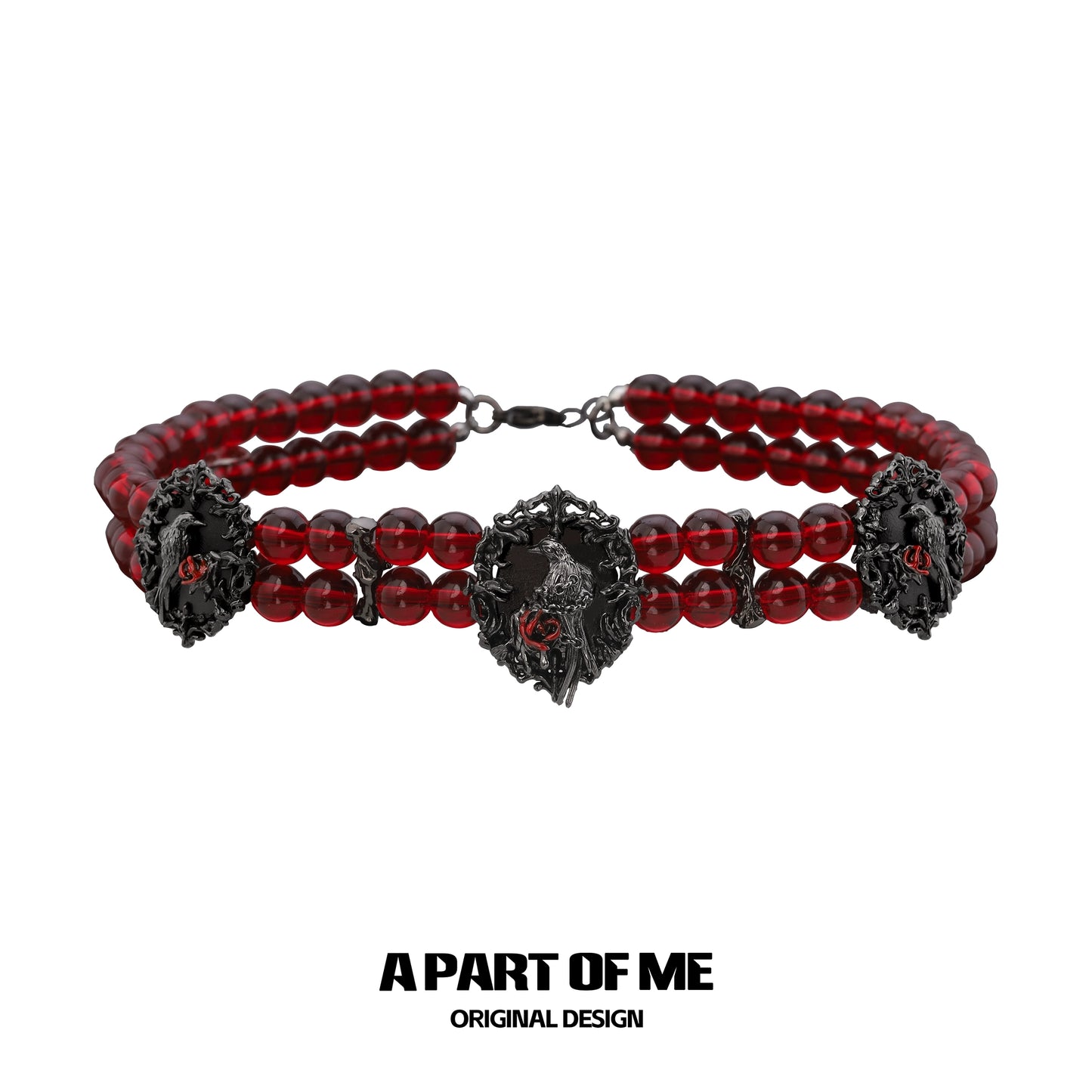 Gothic raven necklace featuring red beads and intricate raven designs for a bold accessory