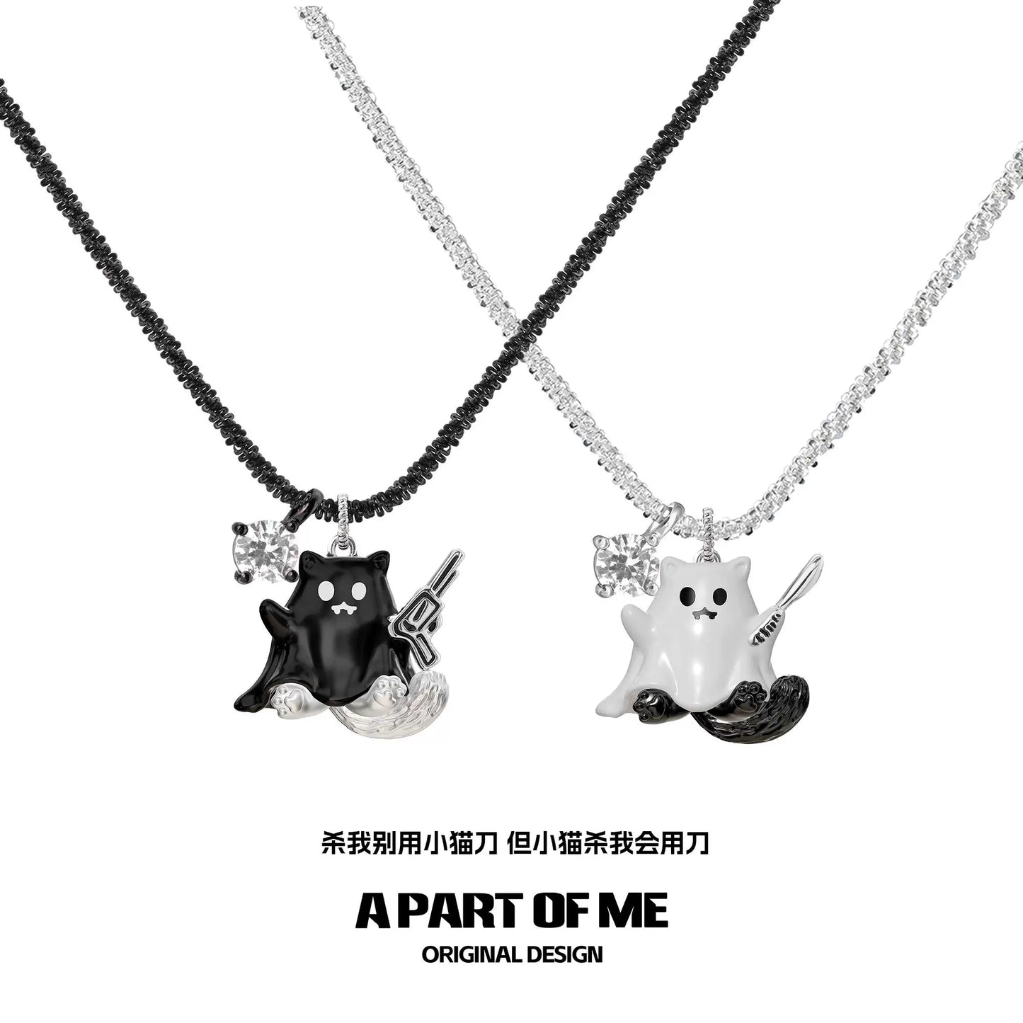 A PART OF ME weapon kitten devil necklace featuring black and silver designs with sparkling accents