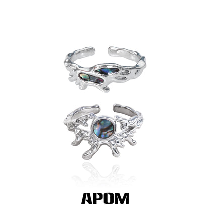 A PART OF ME Silver Deep Sea Jellyfish Ring featuring a colorful iridescent gemstone